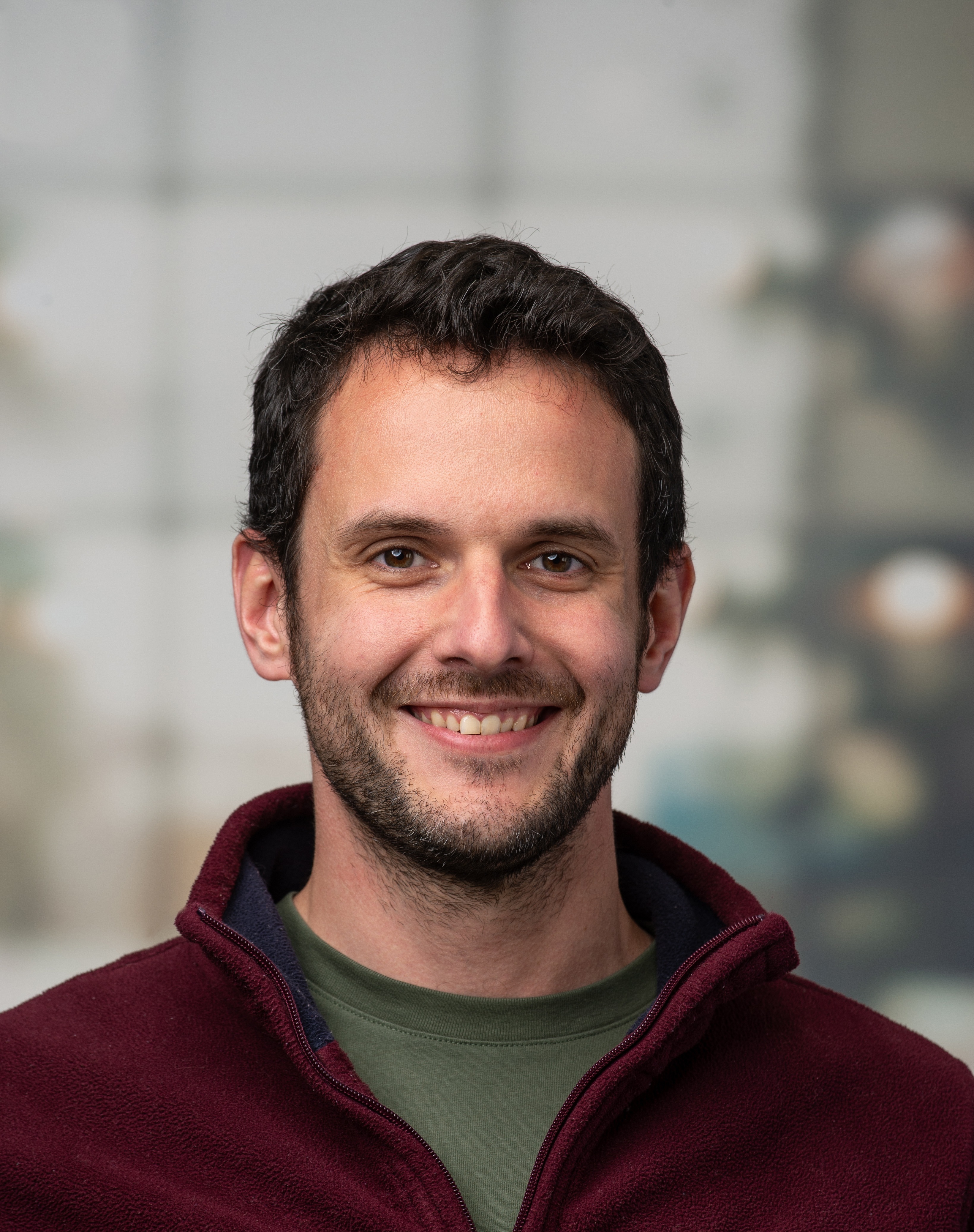 Dr. Chris van der Ploeg